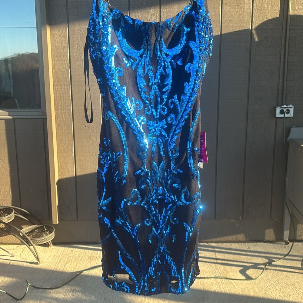 Black and blue short sparkly dress. Never worn, size 5/6, perfect for homecoming